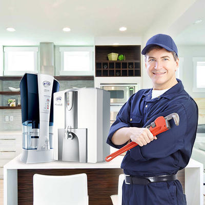 Technician servicing a water purifier